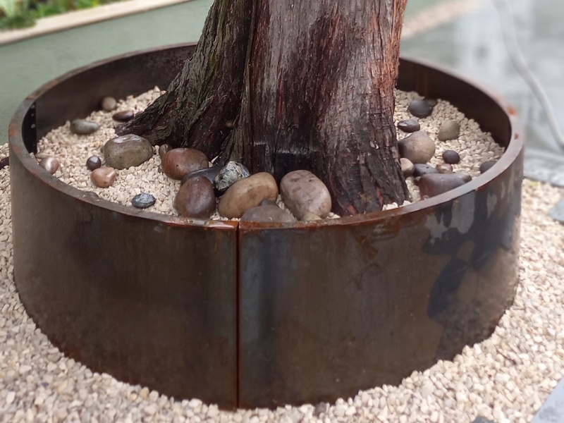 corten tree ring in 4 segments