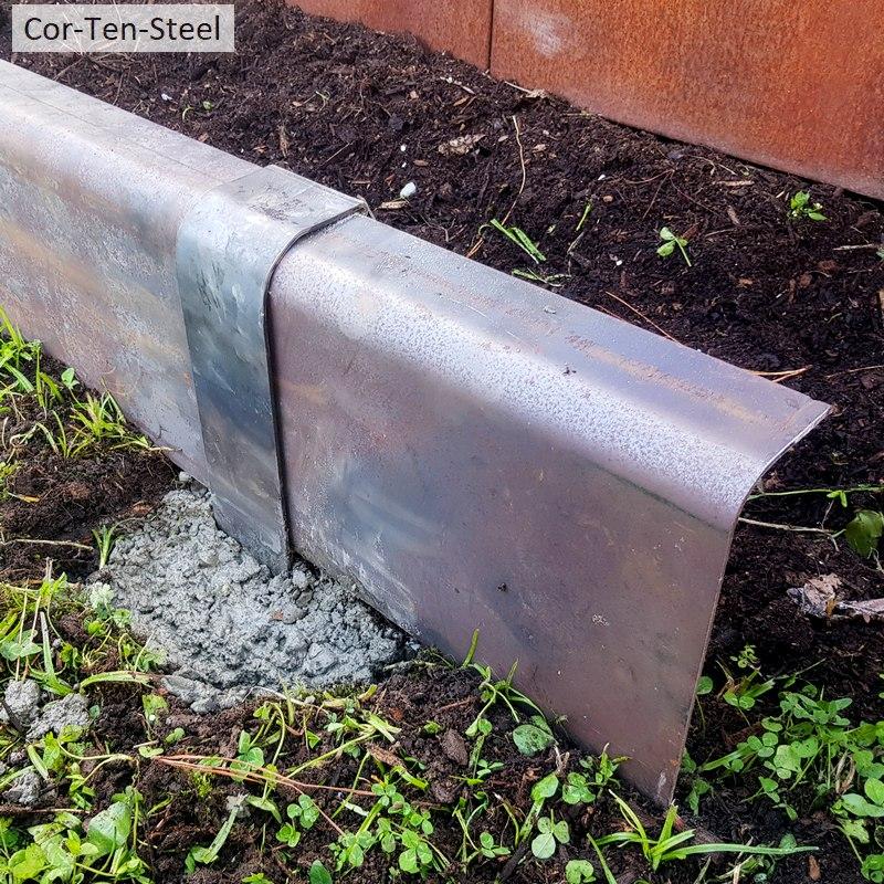 corten edging peg set in concrete