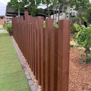 vertical corten posts used as fence