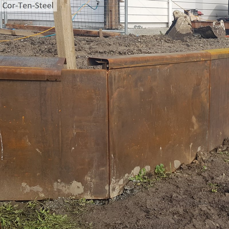corten retaining wall capping added