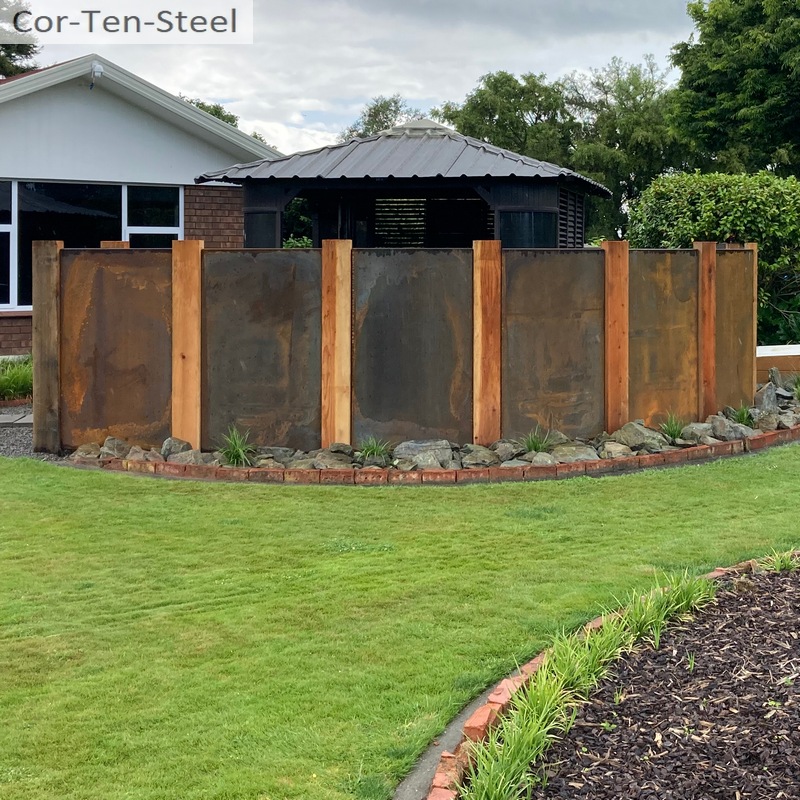 curved corten fence using 1500mm x 900mm corten attached to timber posts