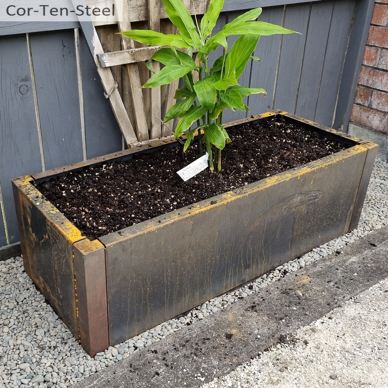 900mm x 300mm x 300mm corten planter with square corner posts