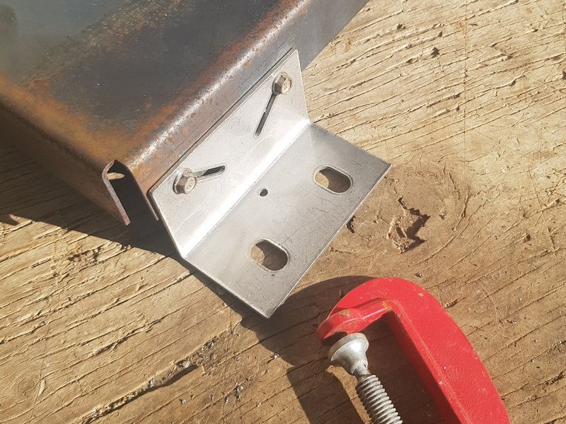 corten bracket connected to corten panel